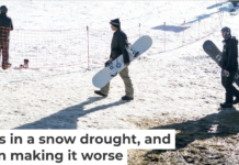 Skiers and snowboarders walk across dry ground to reach a slope at Bear Mountain ski resort on Dec. 21, 2025, in California. Eric Thayer/Los Angeles Times via Getty Images